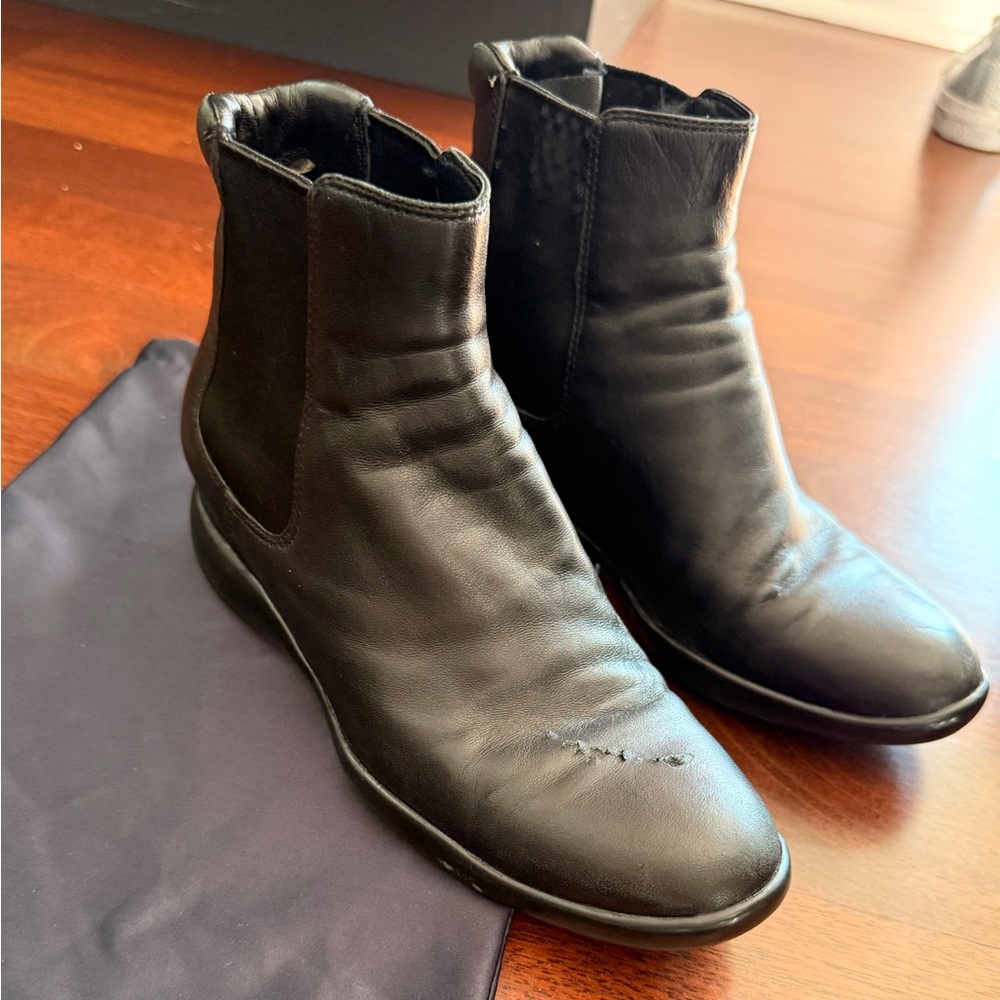 Prada women’s Black Leather Booties